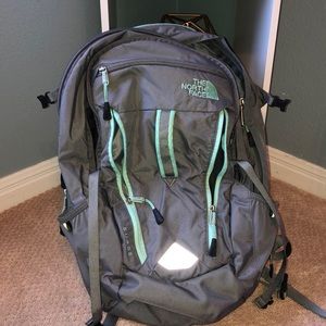 North face backpack with rip on strap (3rd pic)